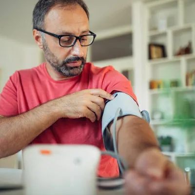 Man Checking Blood Pressure