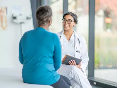 Older male patient with his primary care provider
