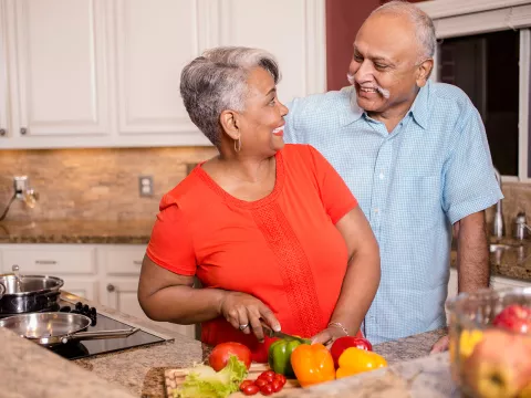 Couple cooking heart healthy meal