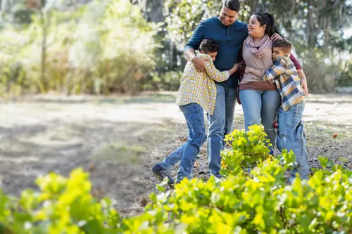 Family Hugging Outdoors